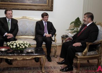 Davutoglu and Mohammed Morsi