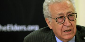 Diplomat Lakhdar Brahimi speaks with former U.S. President Jimmy Carter (not pictured) during a joint news conference in Khartoum