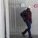 A voter exits a polling station after voting in Phoenix