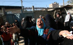 Israeli attacks on Gaza 24 - Palestinan woman in a funeral