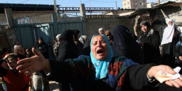 Israeli attacks on Gaza 24 - Palestinan woman in a funeral