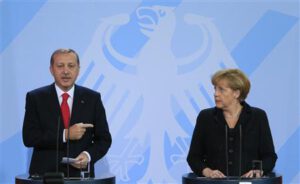 German Chancellor Merkel and Turkish Prime Minister Erdogan address media after talks in Berlin