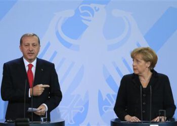 German Chancellor Merkel and Turkish Prime Minister Erdogan address media after talks in Berlin