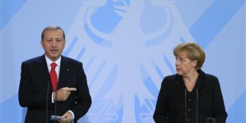 German Chancellor Merkel and Turkish Prime Minister Erdogan address media after talks in Berlin