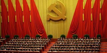 Delegates attend the closing session of 18th National Congress of the Communist Party of China at the Great Hall of the People in Beijing