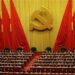 Delegates attend the closing session of 18th National Congress of the Communist Party of China at the Great Hall of the People in Beijing