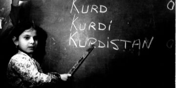kurdish-girl-black-board