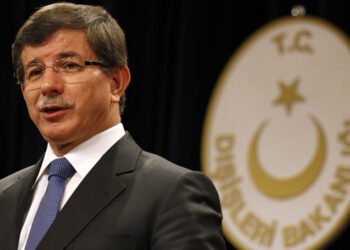 Turkey's Foreign Minister Ahmet Davutoglu talks to the media during a news conference in Ankara