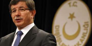 Turkey's Foreign Minister Ahmet Davutoglu talks to the media during a news conference in Ankara
