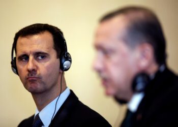 File photo of Turkey's Prime Minister Erdogan and Syria's President Bashar al-Assad attending a news conference in Istanbul