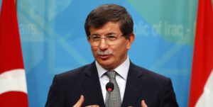 Turkish Foreign Minister Davutoglu addresses the media during a joint news conference with Iraq's Foreign Minister Zebari in Baghdad