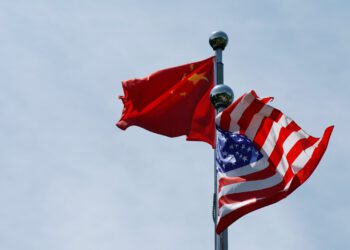The Chinese and U.S. flags flutter near the Bund waterfront area in Shanghai, China, July 30, 2019. (Reuters Photo)