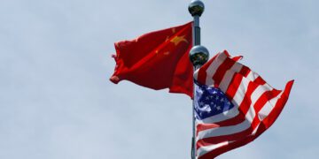 The Chinese and U.S. flags flutter near the Bund waterfront area in Shanghai, China, July 30, 2019. (Reuters Photo)