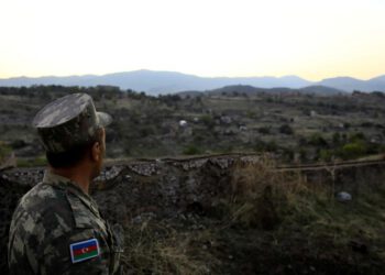 An Azerbaijani soldier inspects the city of Jabrayil, where Azerbaijani forces regained control during the fighting over the occupied Karabakh, Azerbaijan. October 16, 2020. (Reuters)
