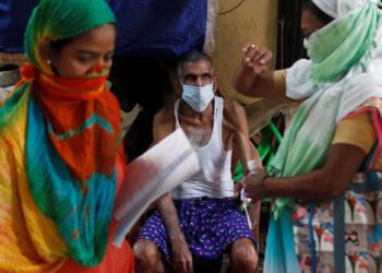 India sees lowest daily virus cases in nearly three months – latest updates