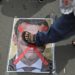 A man steps on a defaced portrait of Emmanuel Macron during a protest on Monday outside the French embassy in Jakarta, Indonesia. Photograph: Dita Alangkara/AP